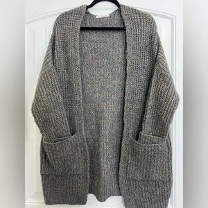 Grey cardigan with copper threading throughout
